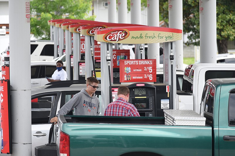 Staff Photo by Matt Hamilton / Drivers fill their tanks at the Speedway in East Ridge on Tuesday, May 11, 2021. 