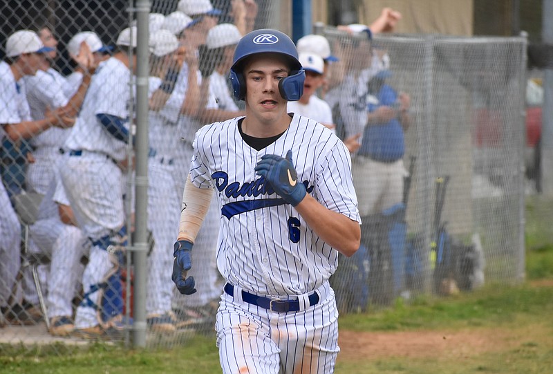 Staff photo by Patrick MacCoon / Sale Creek junior Jakob Elrod scores in a seven run first inning for the Panthers who beat Tellico Plains, 8-5, for the District 4-A championship on Tuesday.