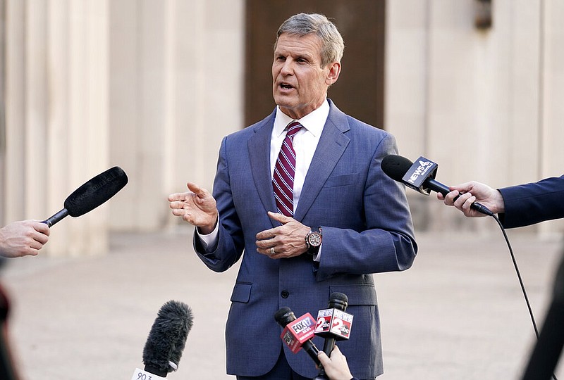 In this Jan. 19, 2021 file photo, Tennessee Gov. Bill Lee answers questions after he spoke to a joint session of the legislature at the start of a special session on education, in Nashville, Tenn. (AP Photo/Mark Humphrey, File)