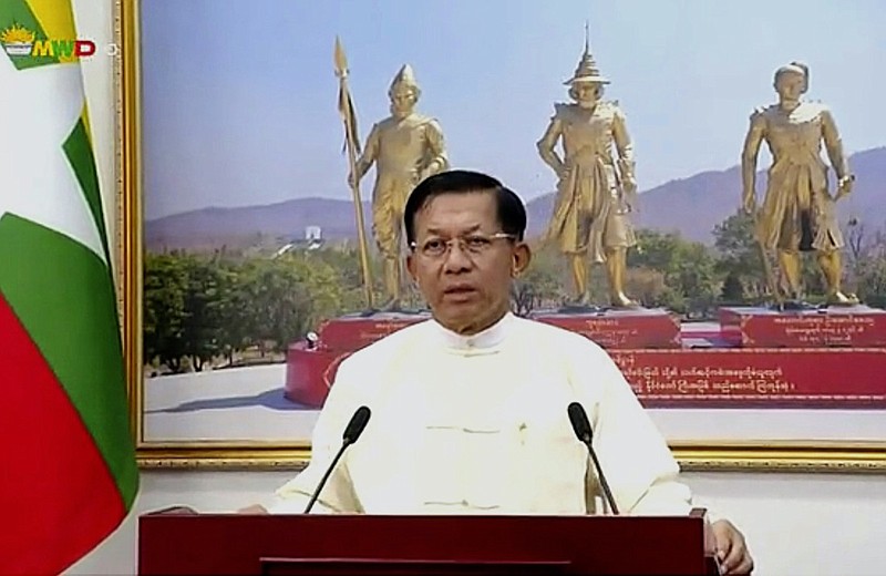 FILE - In this file image from video broadcast April 18, 2021, over the Myawaddy TV channel, Senior Gen. Min Aung Hlaing delivers his address to the public during Myanmar New Year. One hundred days since their takeover, Myanmar's ruling generals maintain just the pretense of control over the country. (Myawaddy TV via AP)
