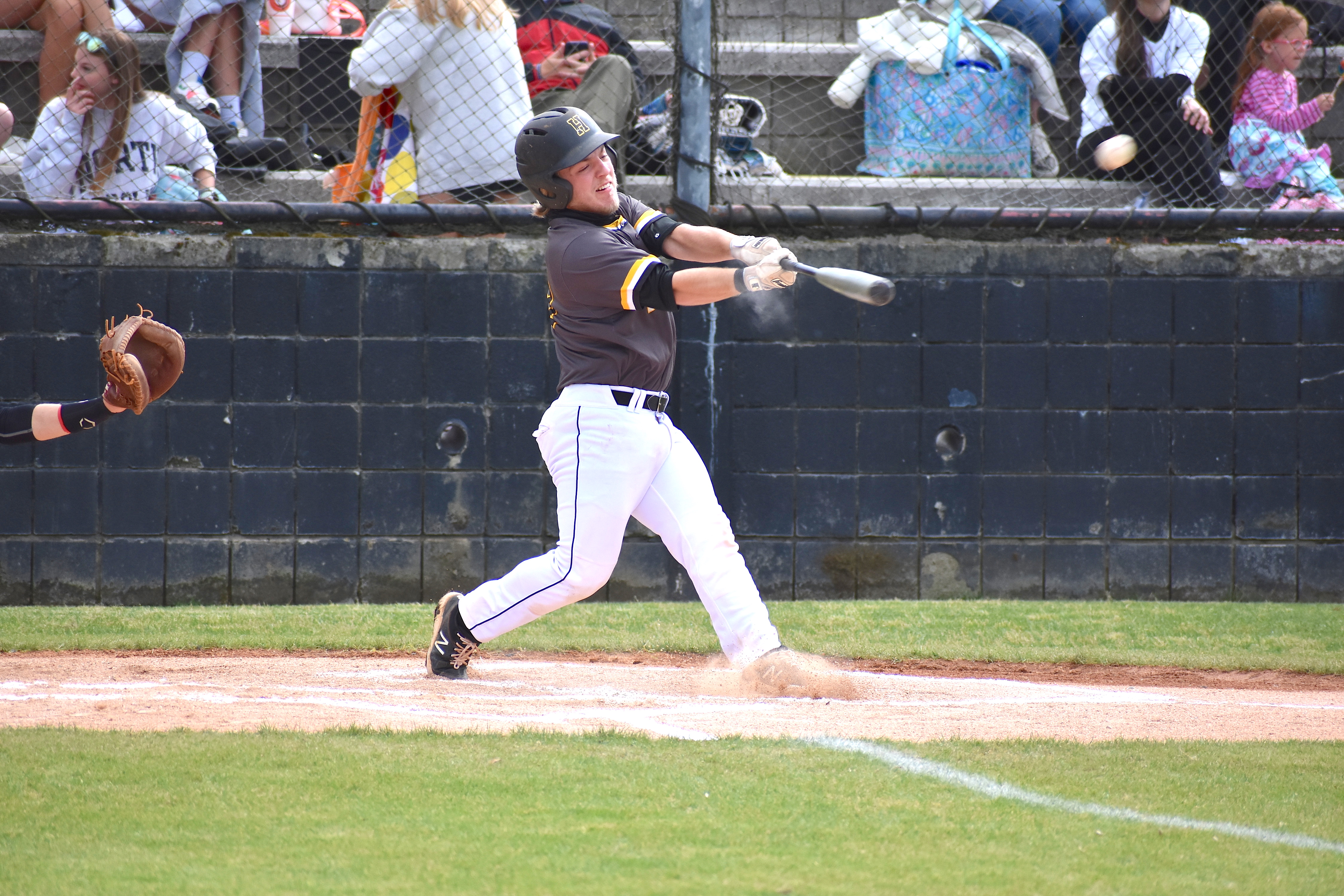 Staff photo by Patrick MacCoon / Hixson standout Kane Johnson hits a three-run home run in Wednesday's District 6-AA championship round against Signal Mountain.