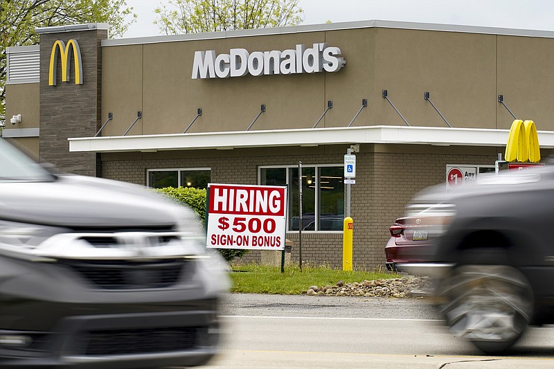 The Associated Press / A hiring sign offers a $500 bonus outside a McDonalds restaurant, in Cranberry Township, Butler County, Pennsylvania, last week.
