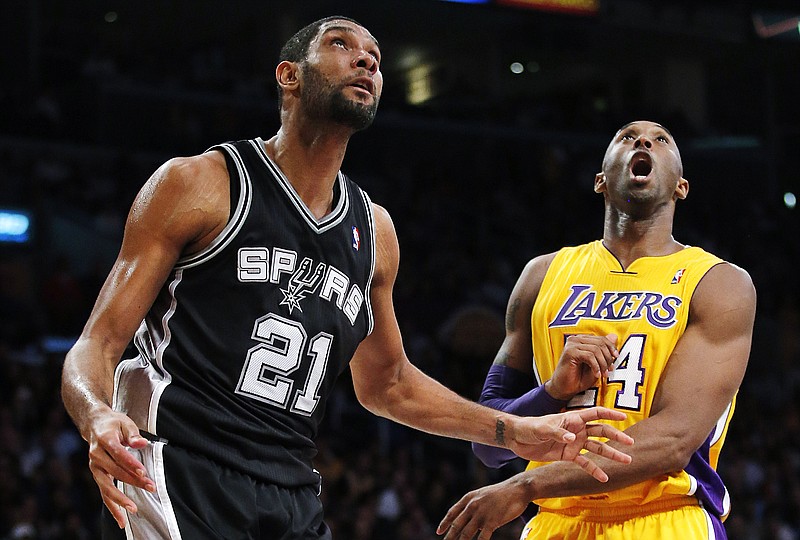 AP photo by Jae C. Hong / The San Antonio Spurs' Tim Duncan, left, and the Los Angeles Lakers' Kobe Bryant watch a shot by Duncan during a game on Nov. 13, 2012, in Los Angeles.