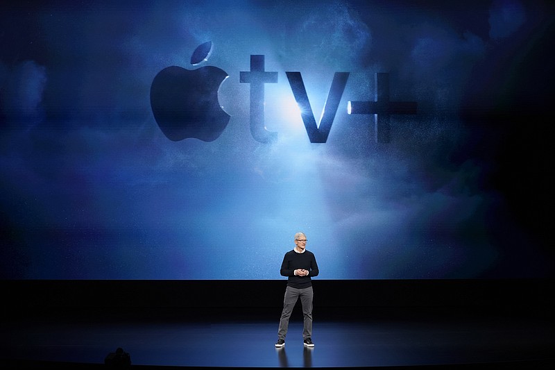 In this Monday, March 25, 2019, file photo, Apple CEO Tim Cook speaks at the Steve Jobs Theater during an event to announce new products, including Apple's steaming TV, in Cupertino, Calif. Streaming services ranging from Netflix to Amazon to Disney+ and others want us to stop sharing passwords. That's the new edict from the giants of streaming media, who are looking to discourage the common practice of sharing account passwords without alienating subscribers who've grown accustomed to the hack. (AP Photo/Tony Avelar, File)