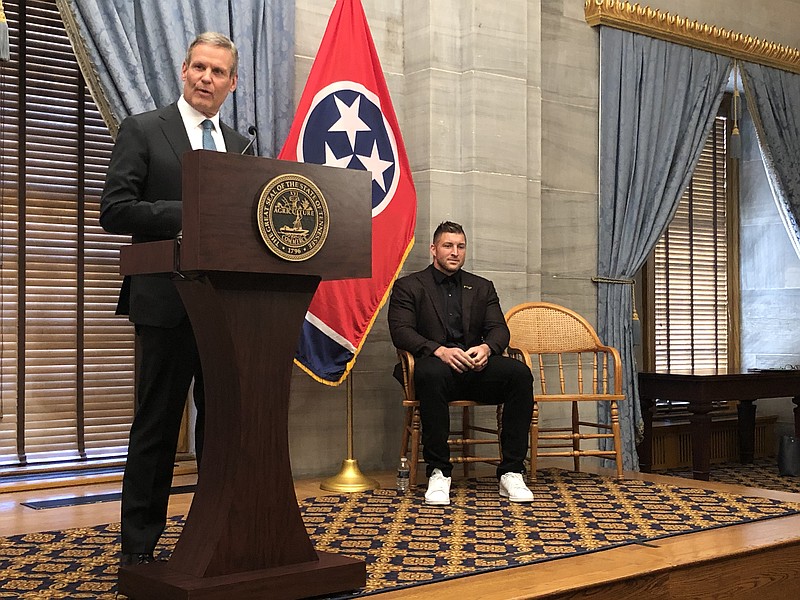 Tennessee Gov. Bill Lee announces $5.4 million in grants to groups for state-funded effort to combat human trafficking on Thursday, May 13, 2021, in a state Capitol news conference. Among recipients was a foundation created by former NFL player Tim Tebow, pictured at right. (Photo by Andy Sher/Chattanooga Times Free Press)