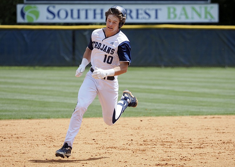 Staff photo by C.B. Schmelter / Gordon Lee's Cade Peterson rounds second base against Academy for Classical Education during the GHSA state semifinals at Gordon Lee High School's Claud Hendrix Field on Saturday, May 15, 2021 in Chickamauga, Ga.