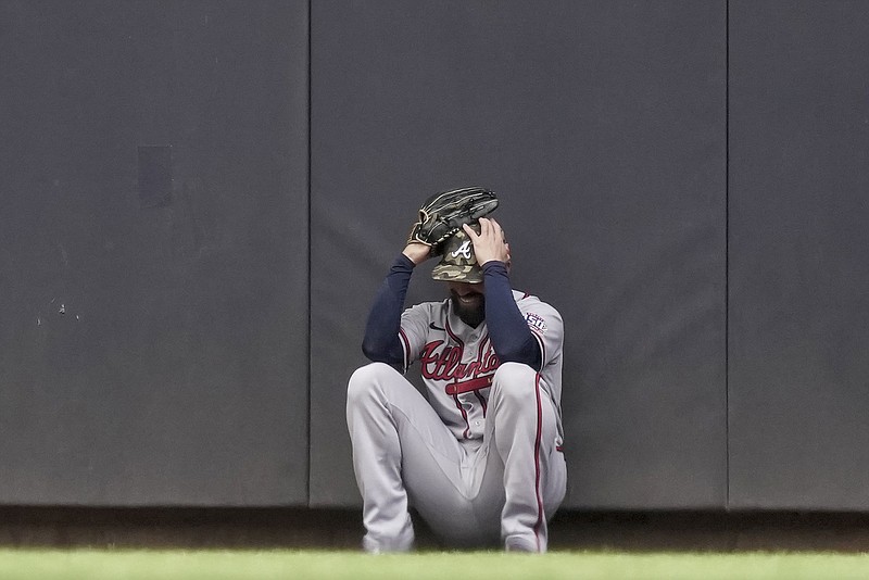 AP photo by Morry Gash / Atlanta Braves center fielder Ender Inciarte reacts after failing to catch a two-run homer hit by the Milwaukee Brewers' Avisail Garcia off Huascar Ynoa during the fifth inning of Sunday's game. Ynoa lasted just 4 1/3 innings after a string of solid starts, and bullpen trouble also played a part in the Braves' 10-9 loss.