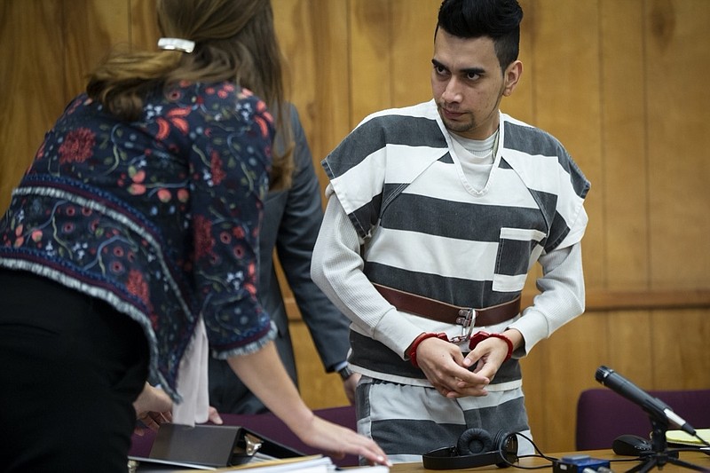 FILE - In this Nov. 14, 2019, file photo, Cristhian Bahena Rivera appears for a hearing at the Poweshiek County Courthouse in Montezuma, Iowa. Citing COVID-19 protocols, Judge Joel Yates said in an order dated Monday, May 10, 2021, that members of the public and news media will not be allowed inside the courtroom when Rivera's trial starts next week. Rivera, 26, is charged with first-degree murder in the death of Mollie Tibbetts, 20, who disappeared in July 2018 while out for a run in her hometown of Brooklyn, Iowa. (Brian Powers/The Des Moines Register via AP File)/The Des Moines Register via AP)