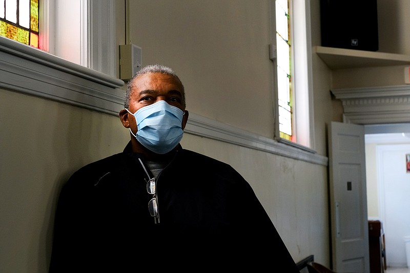 Staff photo by Wyatt Massey / The Rev. Steve Caudle, senior pastor of Greater Second Missionary Baptist Church, stands in the sanctuary of his church in Chattanooga on April 12, 2021. The pastor has worked with community partners to raise awareness about the COVID-19 vaccine and make sure people are getting appointments to get a dose.