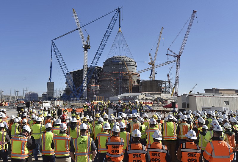 FILE - In this Friday, March 22, 2019, file photo, U.S. Secretary of Energy Rick Perry speaks during a press event at the construction site of Vogtle Units 3 and 4 at the Alvin W. Vogtle Electric Generating Plant, in Waynesboro, Ga. Georgia Power Co. told regulators on Tuesday, May 18, 2021 that the first new reactor at the power plant isn't expected to be complete until January 2022 at the earliest because of delays in testing. (Hyosub Shin/Atlanta Journal-Constitution via AP, File)