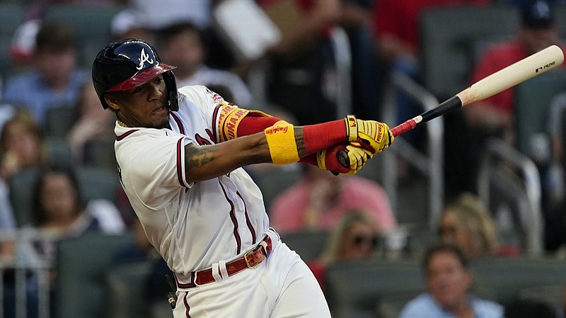 Atlanta Braves right fielder Ronald Acuna Jr. (13) bats against the New York Mets Wednesday, May 19, 2021, in Atlanta. (AP Photo/John Bazemore)