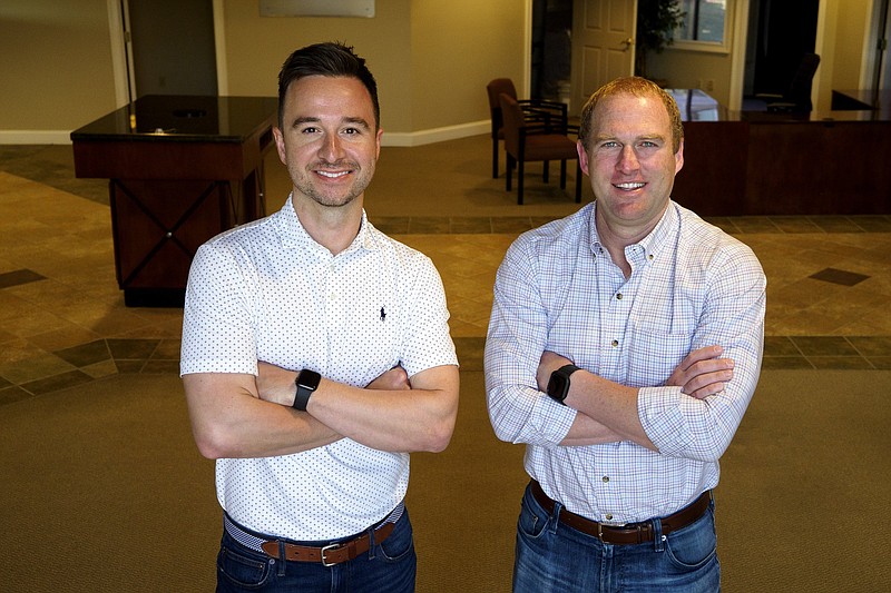 Staff photo by C.B. Schmelter / Simply Bank Directing Retail Officer Anthony Lastoria, left, and President John Owen pose at the former Atlantic Capital building on Friday, May 21, 2021 in Chattanooga, Tenn. Simply Bank will be expanding into the space in East Brainerd.