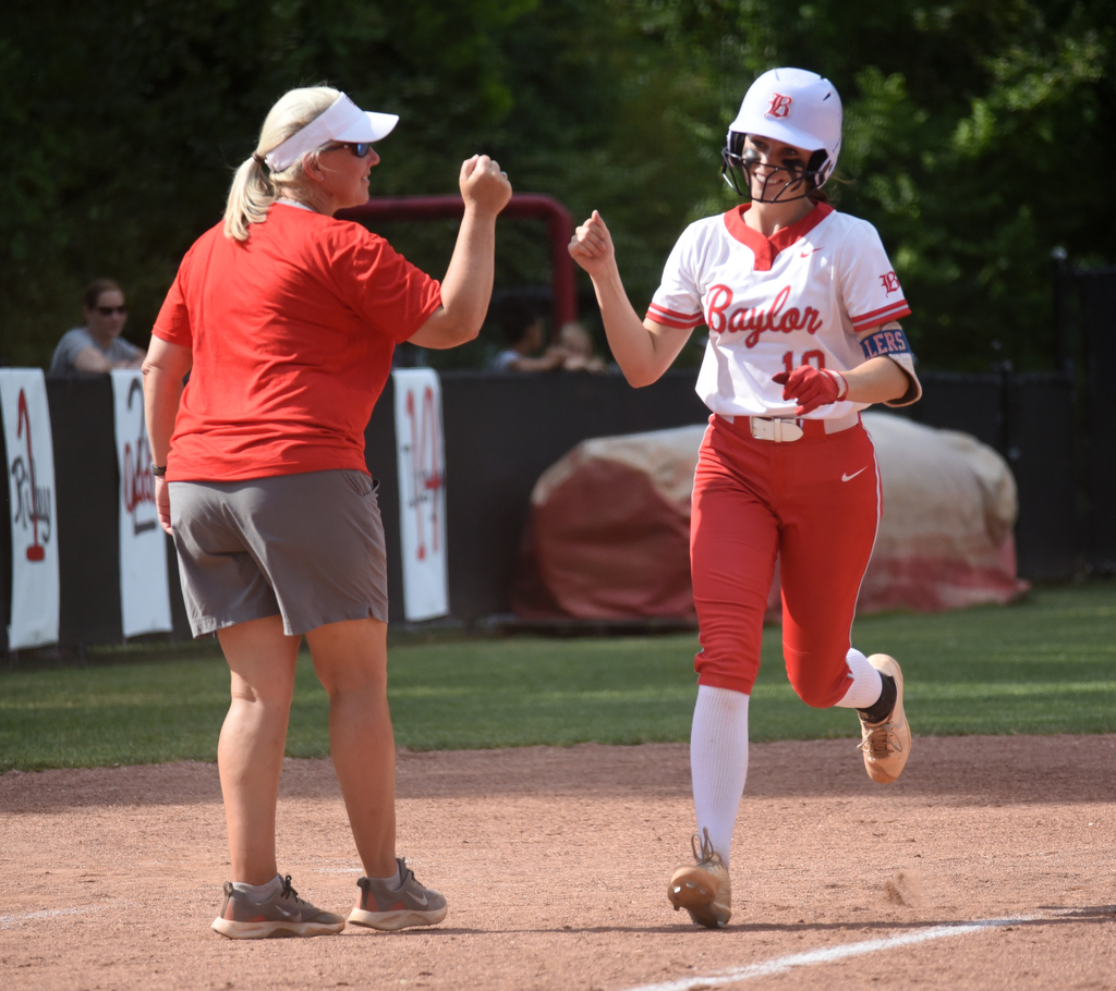 Staff Photo by Matt Hamilton / Baylor coach Kelli Smith congratulates Baylor (10) Ace Sellers after her second home run in the top of the first of the second game against Briarcrest at Baylor School on Friday, May 21, 2021.