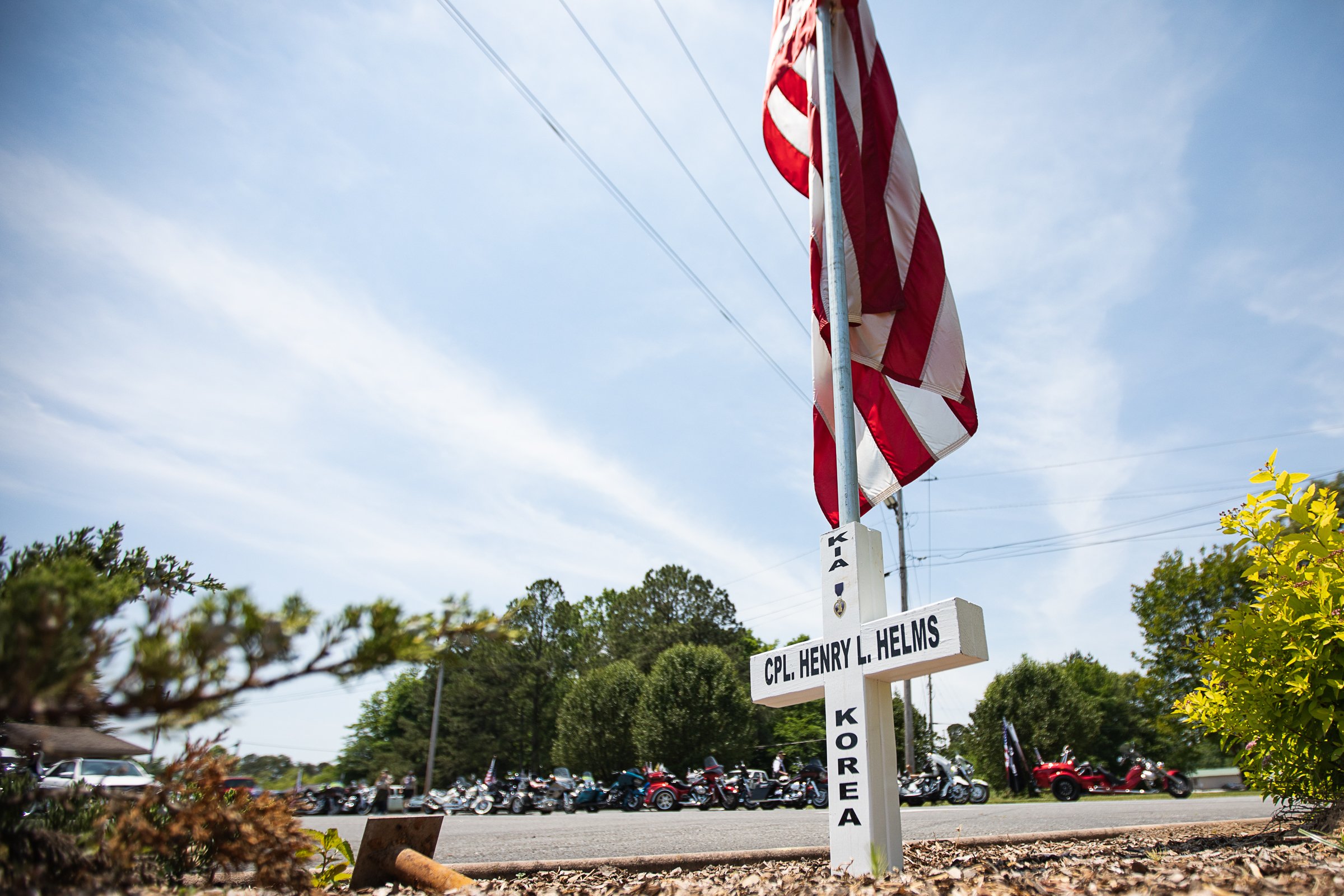 Staff photo by Troy Stolt / A memorial cross for Army Cpl. Henry L. Helms, who was killed in action during The Battle of Chosin Reservoir during the Korean War is seen before a memorial service in his honor on Saturday, May 22, 2021 in Ringgold, Georgia. Helms, who was ruled missing in action for seven decades, was identified by his family and given full honors with funeral rites after a 2018 meeting between North Korean Chairman Kim Jong Un and former President Donald Trump, in which an agreement was struck to repatriate remains of Americans collected from the Korean War.
