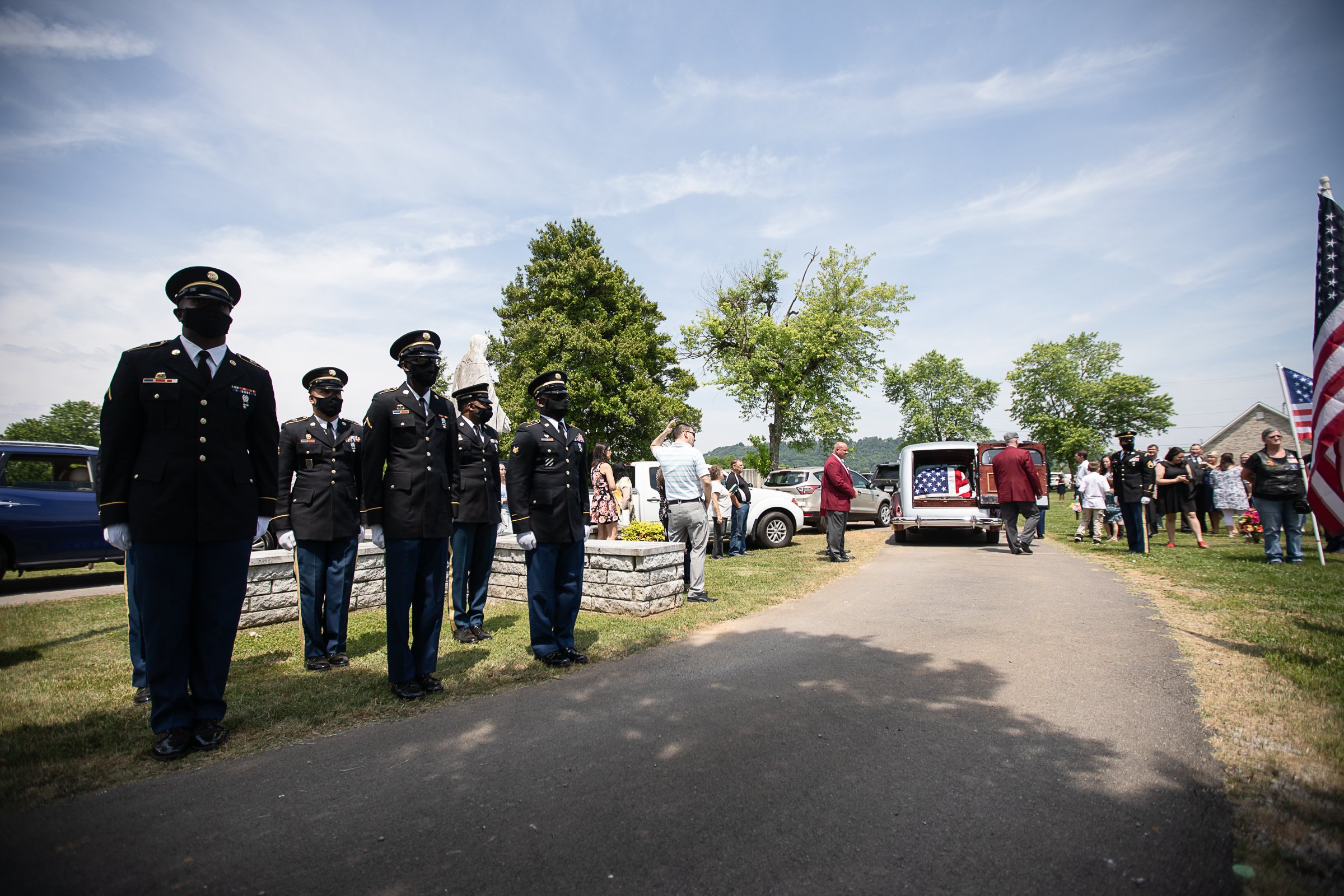 Staff photo by Troy Stolt / The casket holding the remains of Army Cpl. Henry L. Helms, who was killed in action at The Battle of Chosin Reservoir during the Korean War arrives at Anderson Memorial Gardens on Saturday, May 22, 2021 in Ringgold, Georgia. Helms, who was ruled missing in action for seven decades, was identified by his family and given full honors with funeral rites after a 2018 meeting between North Korean Chairman Kim Jong Un and former President Donald Trump, in which an agreement was struck to repatriate remains of Americans collected from the Korean War.