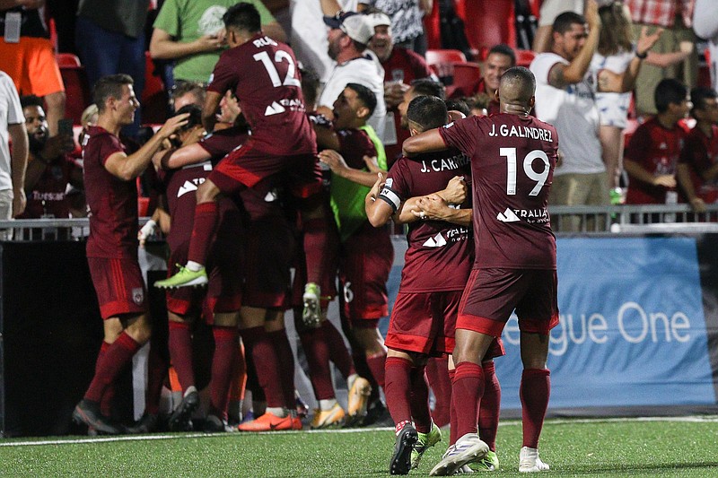 Staff photo by Troy Stolt / The Chattanooga Red Wolves celebrate a goal during stoppage time near the end of their 2-1 win against Fort Lauderdale CF in a USL League One match Saturday night at CHI Memorial Stadium in East Ridge.