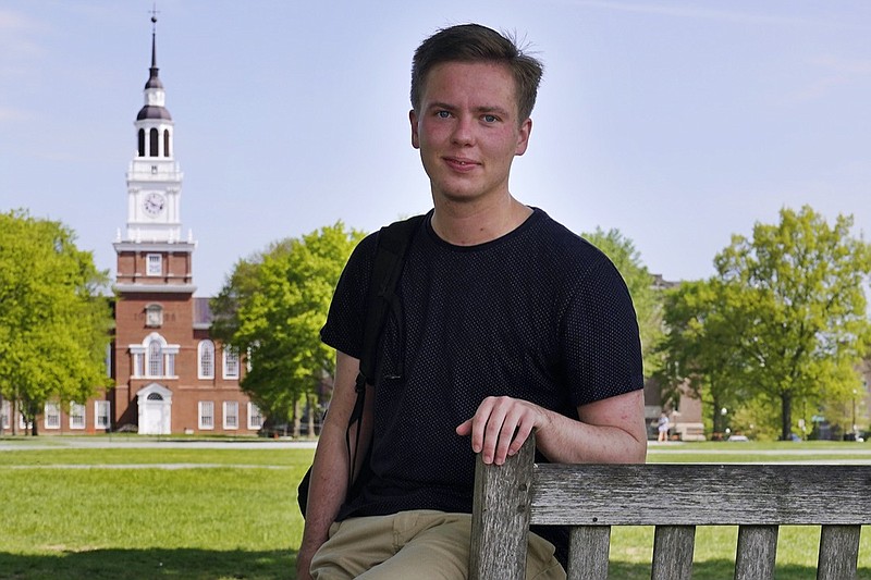 Colin Goodbred, a 22-year-old transgender student, poses on the campus of Dartmouth College, Friday, May 21, 2021, in Hanover, N.H. Goodbred, who was raised in the Nashville suburbs, says the bevy of new laws in Tennessee could keep him from ever calling the state home again. Conservative lawmakers nationwide introduced a flurry of anti-LGBTQ bills this year, but no state's political leaders have gone further than Tennessee in enacting new laws targeting transgender people. (AP Photo/Charles Krupa)