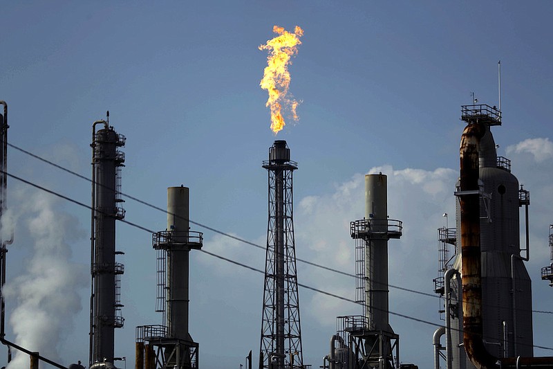 In this Aug. 31, 2017, file photo, a flame burns at the Shell Deer Park oil refinery in Deer Park, Texas. Mexico's President Andres Manuel Lopez Obrador said Monday, May 24, 2021, that it will buy Shell's 50% share in the jointly owned Deer Park refinery. (AP Photo/Gregory Bull, File)