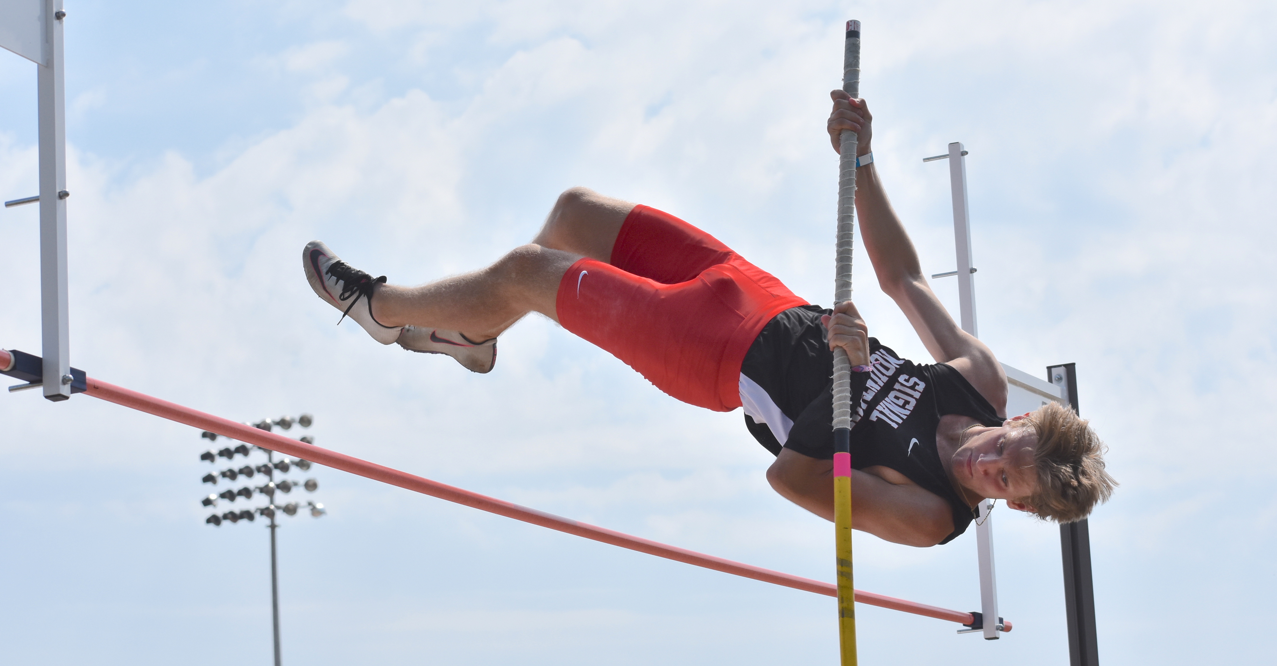 Staff photo by Patrick MacCoon / Signal Mountain's Zach Stong clears the bar with room during Tuesday's TSSAA Division I Small School state championship at Rockvale High School.