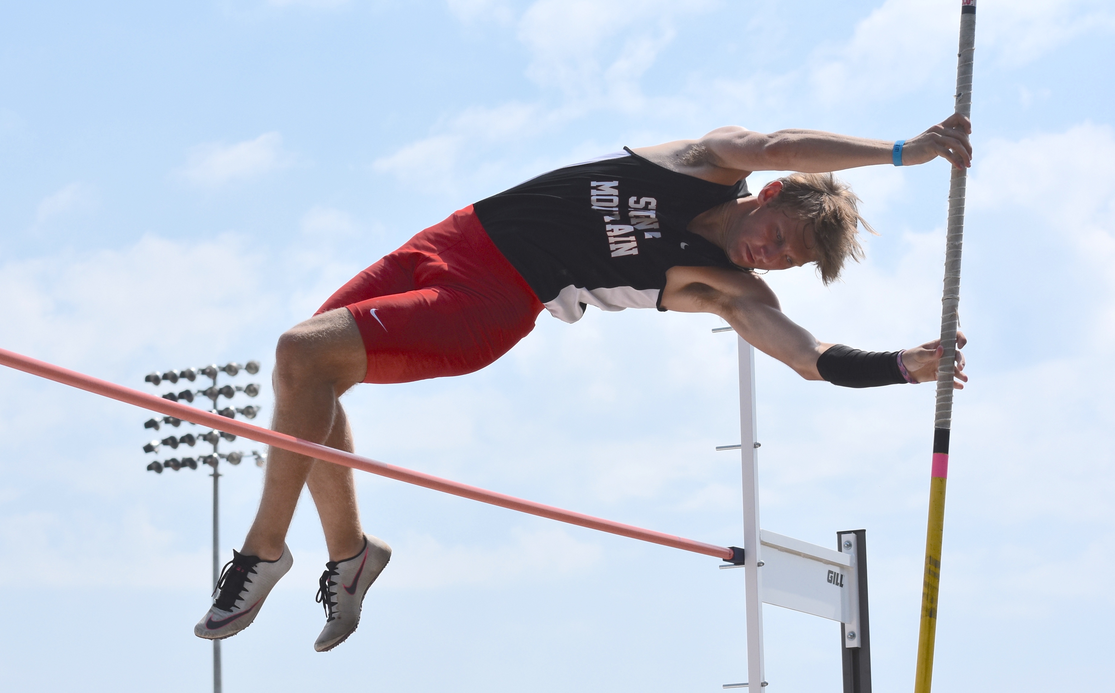 Staff photo by Patrick MacCoon / Signal Mountain pole vaulter Zach Stong clears the bar in the TSSAA Division I Small School state championship held at Rockvale High School on Tuesday.