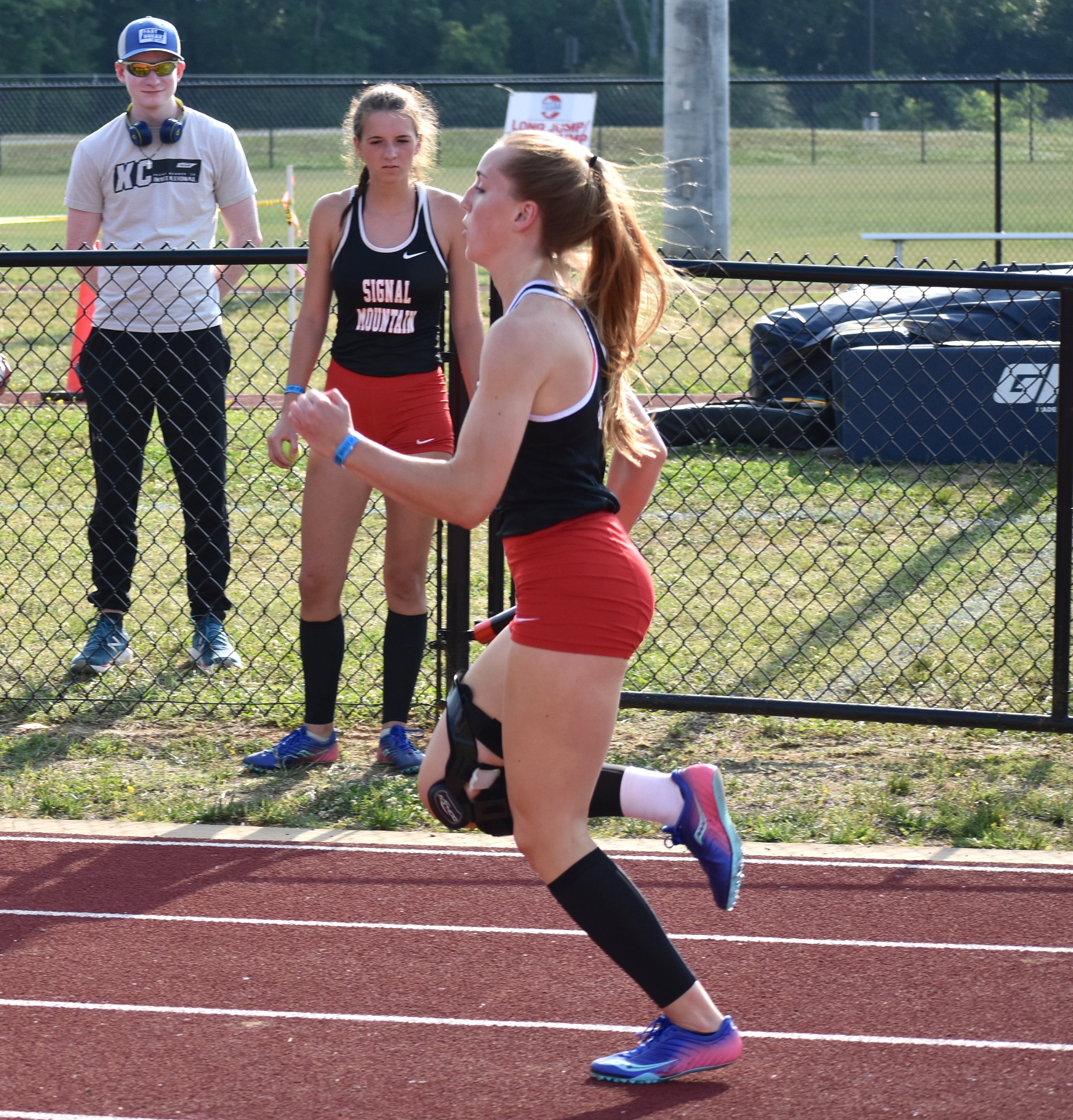 Staff photo by Patrick MacCoon / Signal Mountain senior Briley Lowry runs in a relay race during the TSSAA state track and field championships on Tuesday at Rockvale High School.