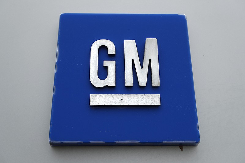 This Jan. 27, 2020 file photo shows a General Motors logo at the General Motors Detroit-Hamtramck Assembly plant in Hamtramck, Mich. General Motors now says it will support efforts by the United Auto Workers union to organize employees at two U.S. electric vehicle battery factories that it's building in Ohio and Tennessee with a joint-venture partner.The company's statement Tuesday, May 25, 2021 about the plants departs from its past stance that the joint venture, called Ultium LLC, would decide on a bargaining strategy. (AP Photo/Paul Sancya, File)