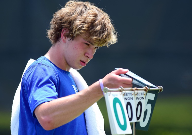 Staff Photo by Robin Rudd / McCallie's Colin Tuttle changes in the score as he dominates Ensworth's Karim Daouk at the Adams Tennis Comples during the TSSAA Spring Fling in Murfreesboro on May 25, 2021. in TSSAA Spring Fling action in Murfreesboro on May 25, 2021.