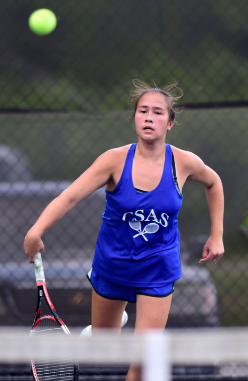 Staff Photo by Robin Rudd / Chattanooga School for Arts and Sciences's Olivia Porterfield hits a serve in the match with Madison Magnet in TSSAA Spring Fling action in Murfreesboro on May 25, 2021.