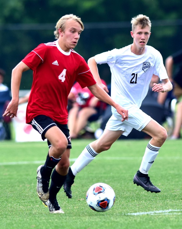 Staff Photo by Robin Rudd / Signal Mountain's Sam Sonksen (4) prepares to take a shot in front of Madison Magnet's goal in TSSAA Spring Fling action in Murfreesboro on May 25, 2021.