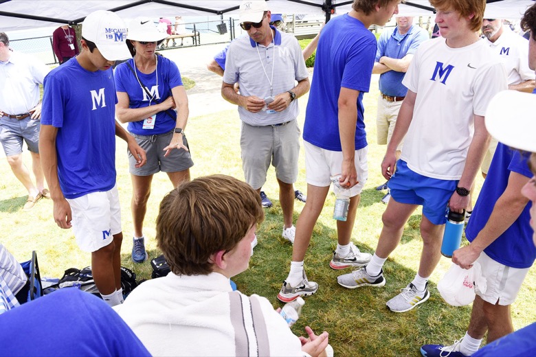 Staff Photo by Robin Rudd / McCallie head coach Jeff Clark, center, talks to the Blue Tornado squad after their victory over Ensworth in TSSAA Spring Fling action in Murfreesboro on May 25, 2021.