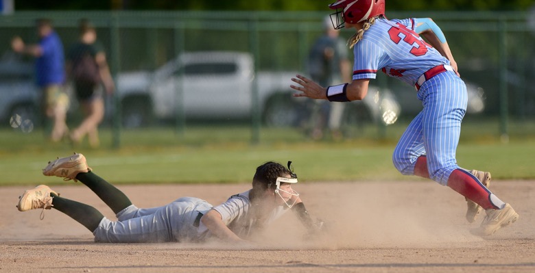 Staff Photo by Robin Rudd / Silverdale shortstop Emry Masterson (32) watches a Tipton-Rosemark head go into the outfield as the runner starts to third. Silverdale faced Tipton-Rosemark in TSSAA Spring Fling softball action at the the Starplex in Murfreesboro on May 25, 2021.