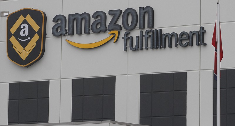 Staff Photo by Dan Henry / The Amazon fulfillment center in Chattanooga is part of a global company with a capitalization of over $1.6 trillion. Amazon is buying MGM Studios for $8.45 billion.