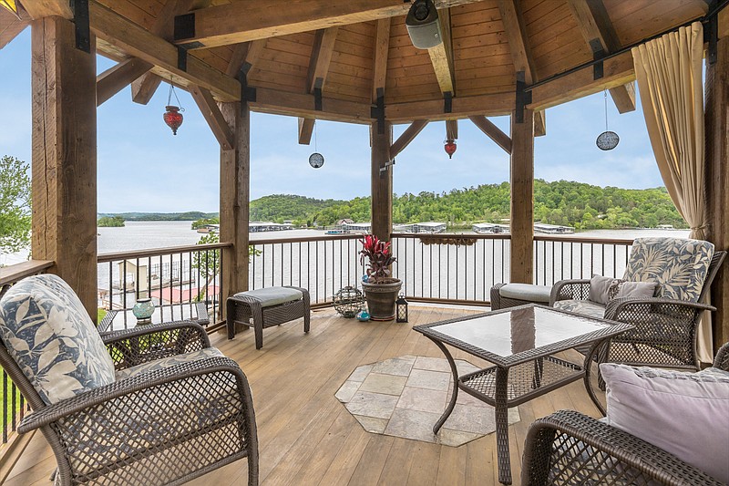 Contributed photography by Philip Slowiak Photography / The lakefront home at 6422 Cobble Lane in Harrison sold in June 2020 for $1.9 million. 