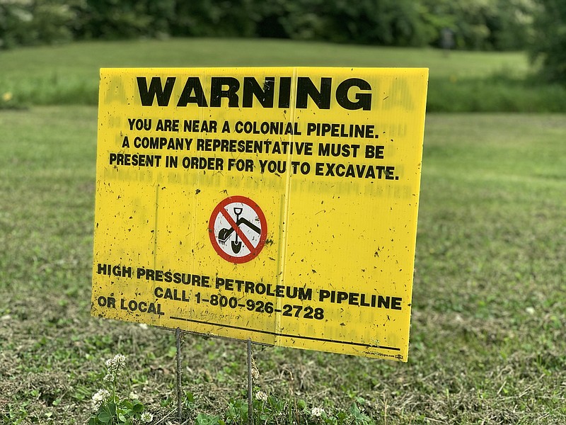 Staff Photo by Allison Collins Colonial Pipeline warning sign located at Camp Jordan.