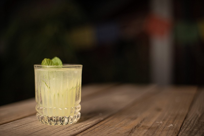 Staff photo by Troy Stolt / Cherry Street Tavern's Cucumber Cooler cocktail is seen.