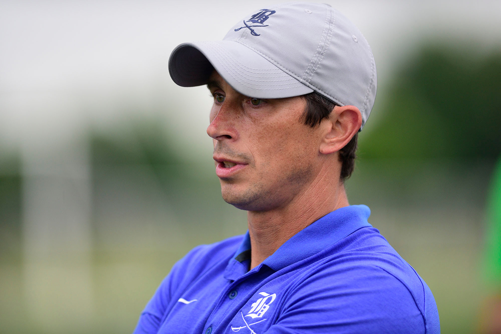 Staff Photo by Robin Rudd / Boyd-Buchanan head coach Dustin Walker follows the action. Boyd-Buchanan faced Franklin Grace at the Sigel Soccer Complex in Murfreesboro on May 26, 2021.