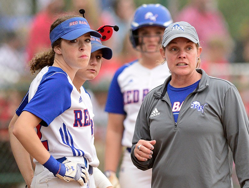 Staff photo by Robin Rudd /  Red Bank softball coach Mandi Munn talks with her outfielders before the Lady Lions' Class AA state tournament game against Lexington on Wednesday in Murfreesboro, Tenn.