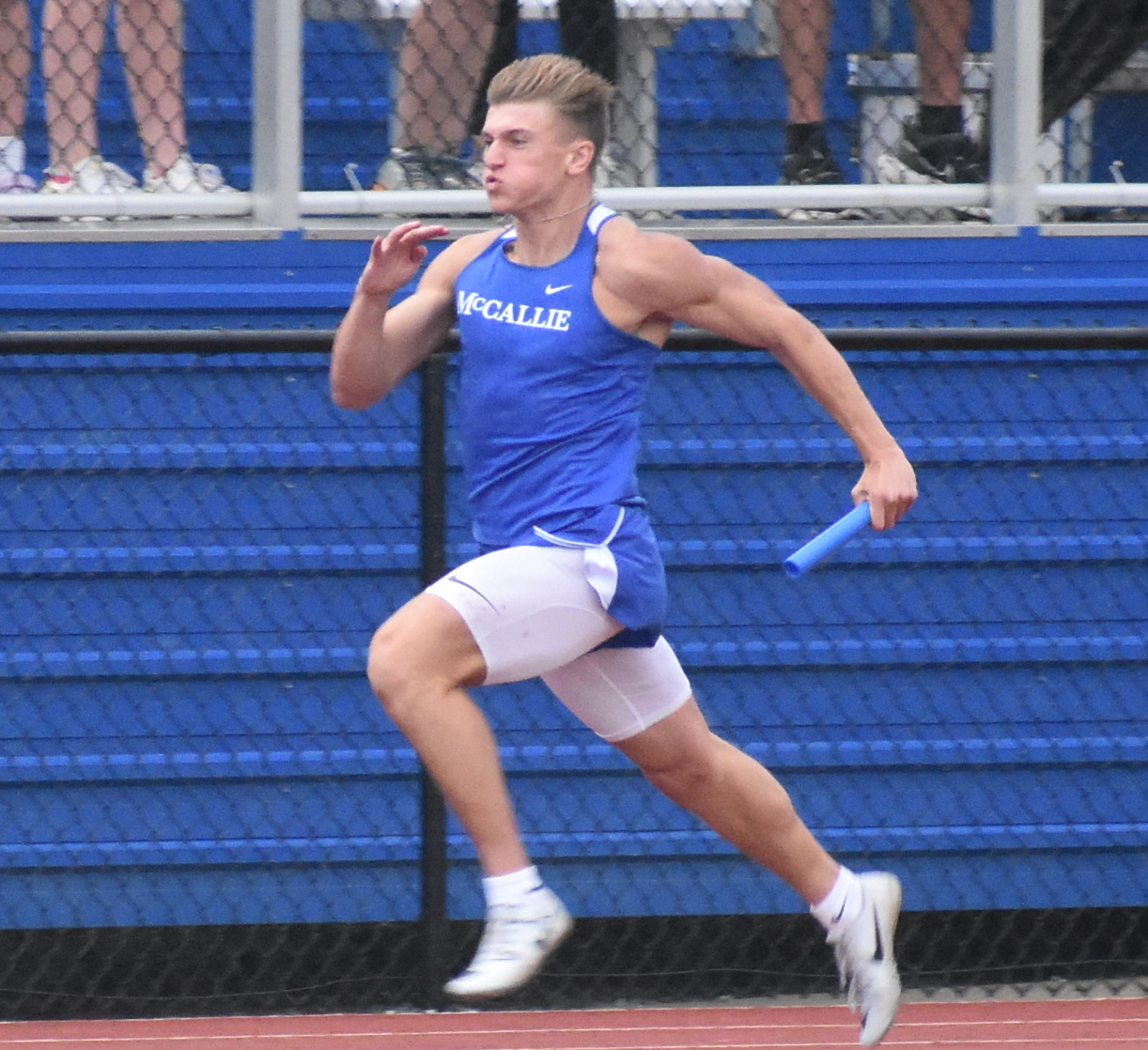 Staff photo by Patrick MacCoon / McCallie's Jackson Burns finishes off the Blue Tornado's 4x100 relay state championship at the TSSAA Division II-AA meet Wednesday in Murfreesboro.