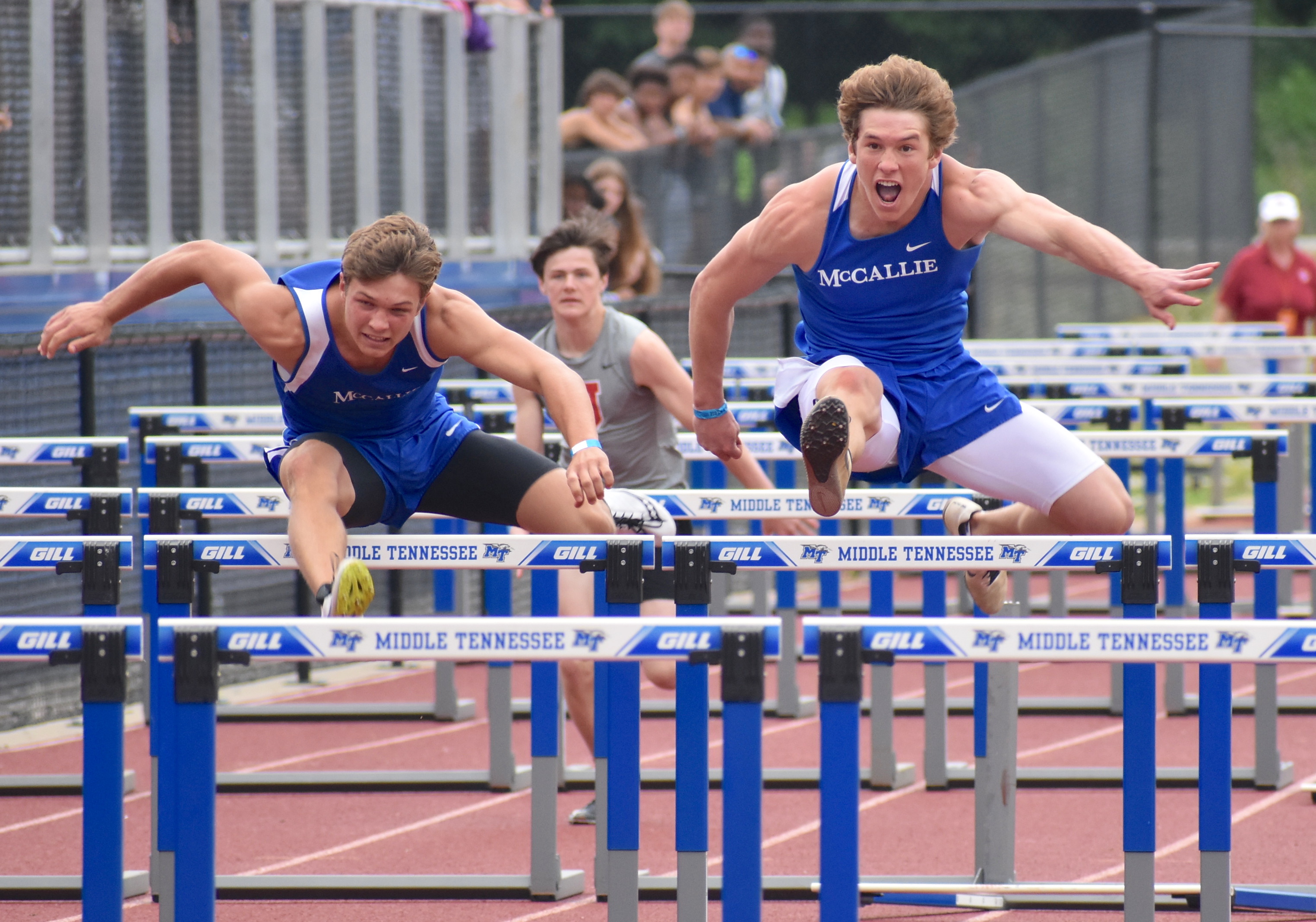 Staff photo by Patrick MacCoon / McCallie's Michael May and Nic Robinson were the top two finishers in the 110-meter hurdles at the TSSAA Division II-AA state meet Wednesday in Murfreesboro.