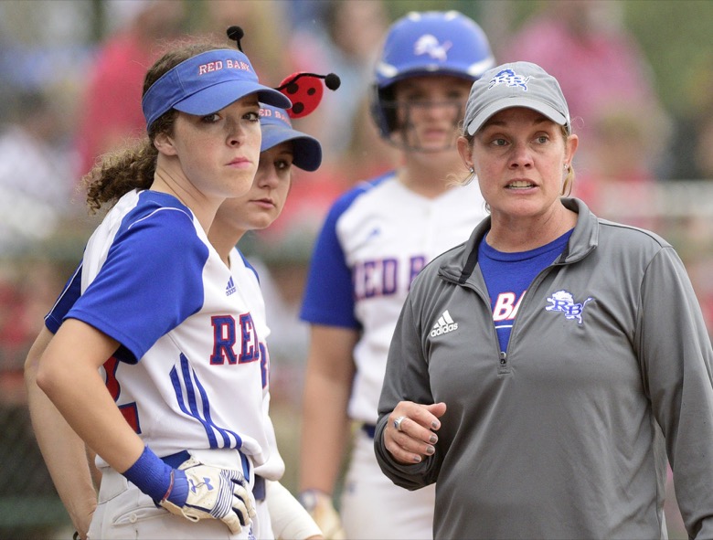 Staff Photo by Robin Rudd / Red Bank head coach Mandi Munn talks with her outfielders before the game. Red Bank played Lexinton in TSSAA Spring Fling softball at the Starplex in Murfreesboro on May 26, 2021.