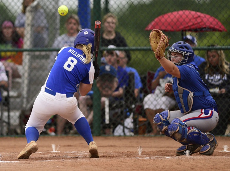 Staff Photo by Robin Rudd / Sale Creek's Brooke Williford (8) is hit in the helmet by the pitch. Sale Creek played Huntland in TSSAA Spring Fling softball at the Starplex in Murfreesboro on May 26, 2021.