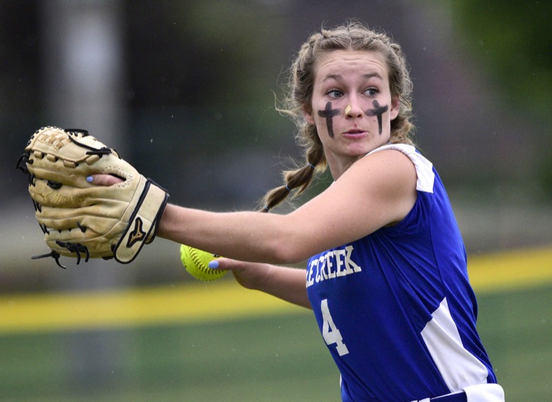 Staff Photo by Robin Rudd / Sale Creek' leftfielder Trista Frazier (4) prepares to make a throw to home. She would throw the Huntland runner out. Sale Creek played Huntland in TSSAA Spring Fling softball at the Starplex in Murfreesboro on May 26, 2021.