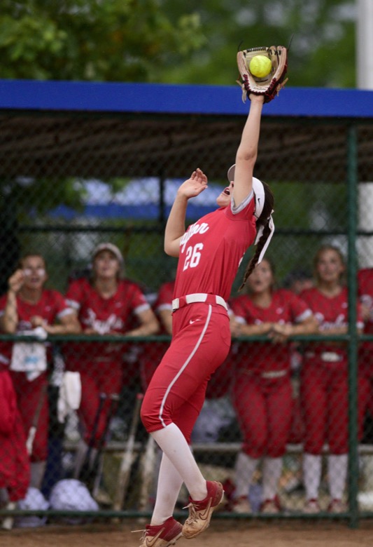 Staff Photo by Robin Rudd / Baylor third baseman Raven Jones (26) makes a catch on high bunt. Baylor placed GPS in TSSAA Spring Fling softball at the Starplex in Murfreesboro on May 26, 2021.