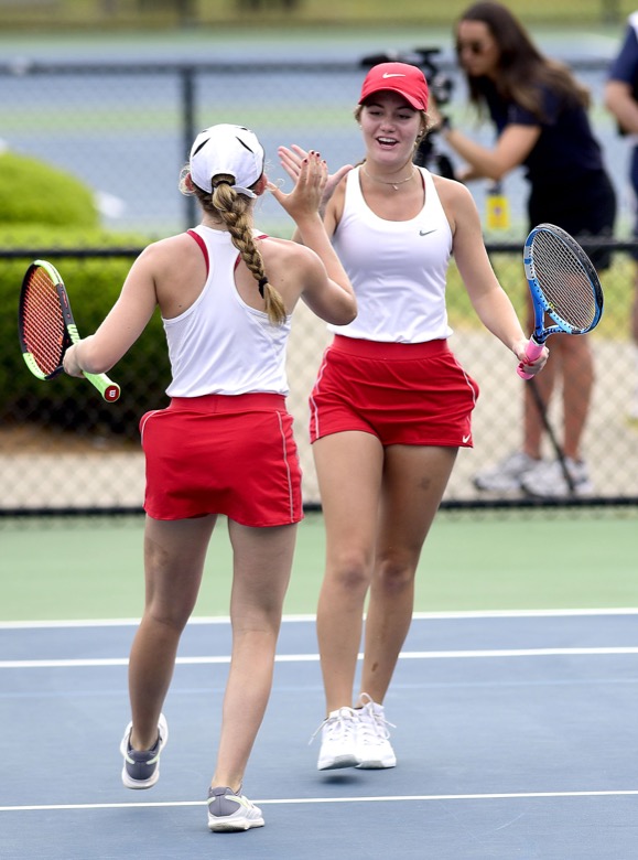Staff Photo by Robin Rudd / From left Baylor's Ensley Collins and Helen Guerry celebrate a point in their doubles match with Knox Catholic in TSSAA Spring Fling tennis at the the Adams Tennis Center in Murfreesboro on May 26, 2021.