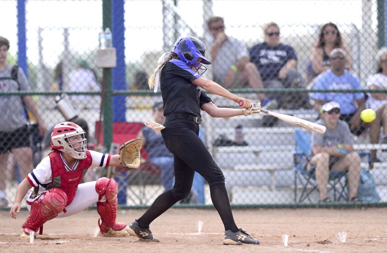 Staff Photo by Robin Rudd / GPS's Madalyn Hubbard (4) makes contact. GPS faced St. Benedict in TSSAA Spring Fling softball at the the Starplex in Murfreesboro on May 26, 2021.