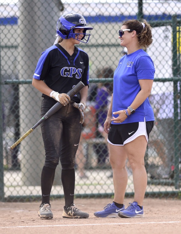 Staff Photo by Robin Rudd / GPS head coach Martha Hanzelik confers with Kennedy Moody (10). GPS faced St. Benedict in TSSAA Spring Fling softball at the the Starplex in Murfreesboro on May 26, 2021.