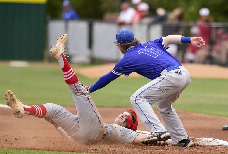 Staff Photo by Robin Rudd / Baylor's Henry Godbout (2) is picked off first as McCallie's Grayson Glover (16) applies the tag. Baylor faced McCalliein TSSAA Spring Fling baseball at Wilson Central High School in Galdeville on May 26, 2021.