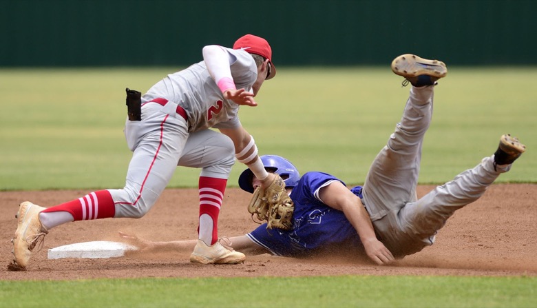 Staff Photo by Robin Rudd / Baylor second baseman Henry Godbout (2) tags out McCallie's Carter Hweitt (22) at second. Baylor faced McCalliein TSSAA Spring Fling baseball at Wilson Central High School in Galdeville on May 26, 2021.