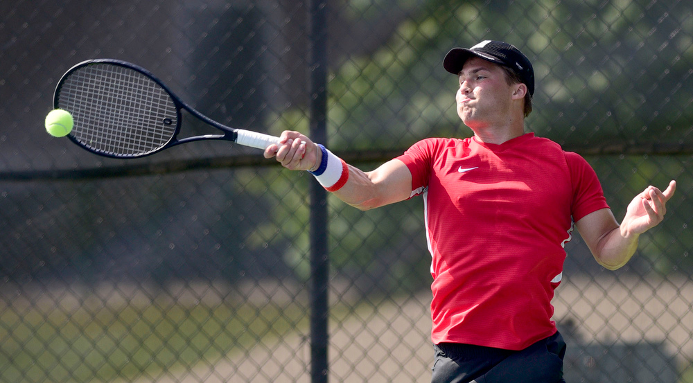 Staff Photo by Robin Rudd / Collegedale Academy's Joby Nash hits a forehand to Lusanne's Danny Hamze during TSSAA Spring Fling tennis at the Adams Tennis Complex in Murfreesboro on May 27, 2021.
