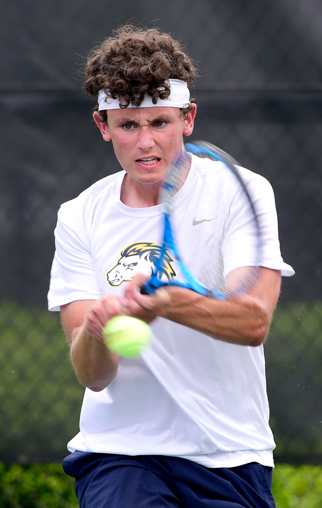 Staff Photo by Robin Rudd / Walker Valley's Jacob Johnson hits a backhand during his match with Collierville's Ranjay Auil at the Adams Tennis Complex in Murfreesboro on May 27, 2021.